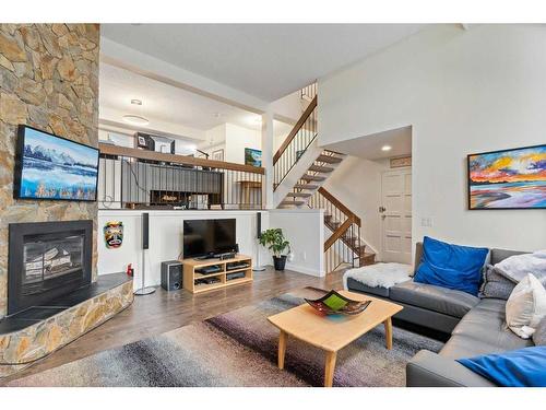 41-700 Ranch Estates Place Nw, Calgary, AB - Indoor Photo Showing Living Room With Fireplace