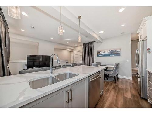 4661 Seton Drive Se, Calgary, AB - Indoor Photo Showing Kitchen With Double Sink