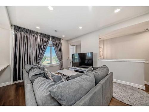 4661 Seton Drive Se, Calgary, AB - Indoor Photo Showing Living Room