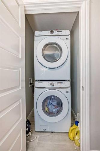 4661 Seton Drive Se, Calgary, AB - Indoor Photo Showing Laundry Room