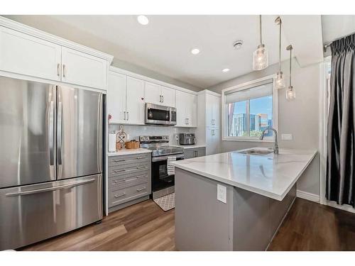 4661 Seton Drive Se, Calgary, AB - Indoor Photo Showing Kitchen With Stainless Steel Kitchen With Upgraded Kitchen