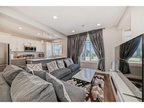 4661 Seton Drive Se, Calgary, AB - Indoor Photo Showing Living Room