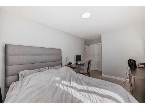 4661 Seton Drive Se, Calgary, AB - Indoor Photo Showing Bedroom