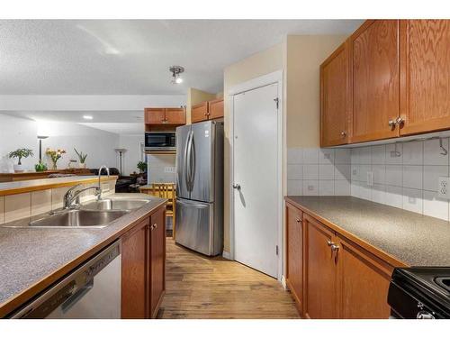 552 Prestwick Circle Se, Calgary, AB - Indoor Photo Showing Kitchen With Double Sink