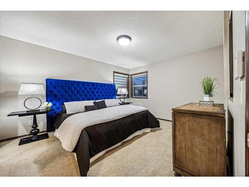 9 Pantego Link Nw, Calgary, AB - Indoor Photo Showing Bedroom