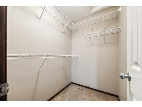 9 Pantego Link Nw, Calgary, AB - Indoor With Storage