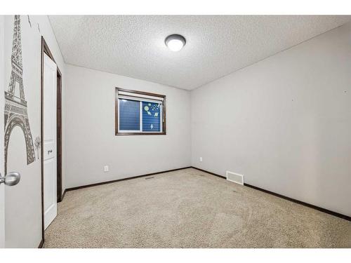 9 Pantego Link Nw, Calgary, AB - Indoor Photo Showing Other Room