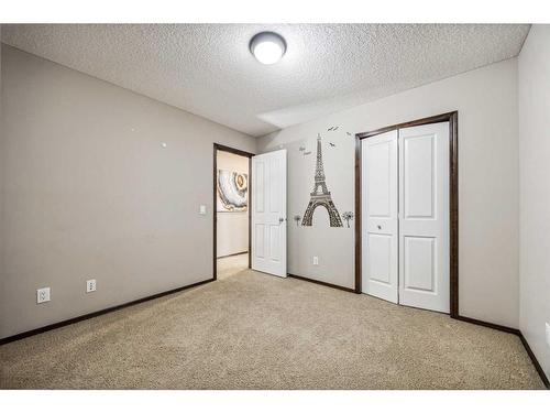 9 Pantego Link Nw, Calgary, AB - Indoor Photo Showing Other Room