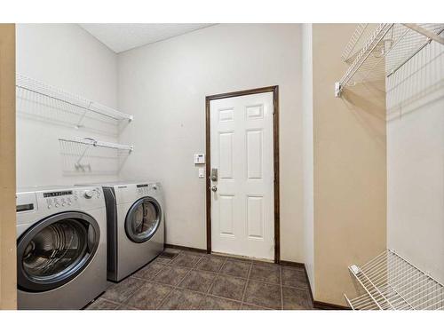 9 Pantego Link Nw, Calgary, AB - Indoor Photo Showing Laundry Room