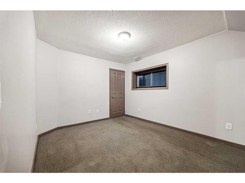 9 Pantego Link Nw, Calgary, AB - Indoor Photo Showing Other Room