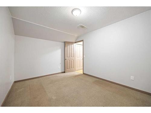 9 Pantego Link Nw, Calgary, AB - Indoor Photo Showing Other Room