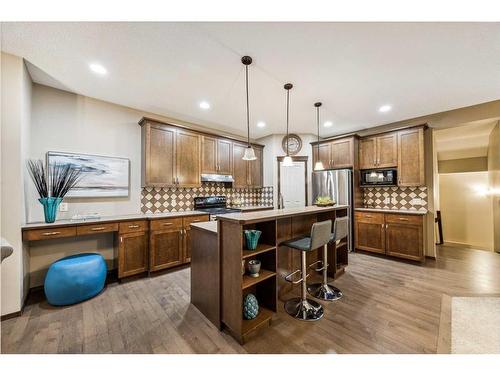 9 Pantego Link Nw, Calgary, AB - Indoor Photo Showing Kitchen With Upgraded Kitchen