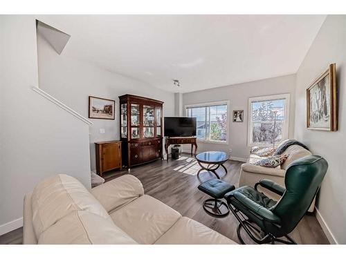 2409 Jumping Pound Common, Cochrane, AB - Indoor Photo Showing Living Room