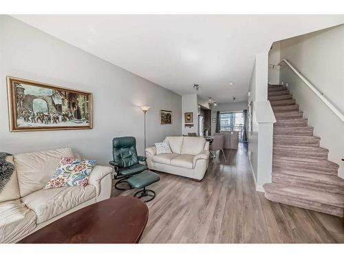 2409 Jumping Pound Common, Cochrane, AB - Indoor Photo Showing Living Room