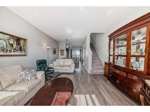 2409 Jumping Pound Common, Cochrane, AB - Indoor Photo Showing Living Room