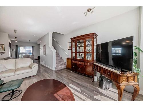 2409 Jumping Pound Common, Cochrane, AB - Indoor Photo Showing Living Room