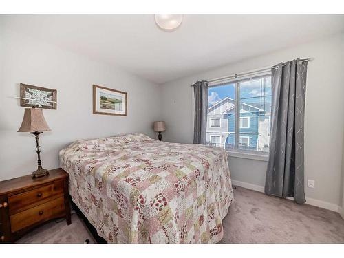 2409 Jumping Pound Common, Cochrane, AB - Indoor Photo Showing Bedroom