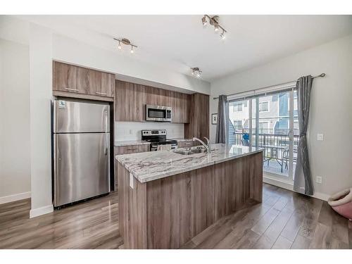 2409 Jumping Pound Common, Cochrane, AB - Indoor Photo Showing Kitchen