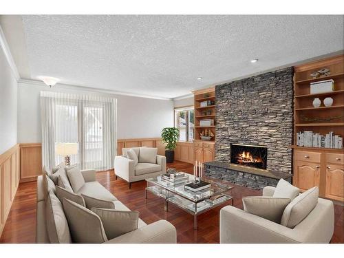 1612 48 Avenue Sw, Calgary, AB - Indoor Photo Showing Living Room With Fireplace