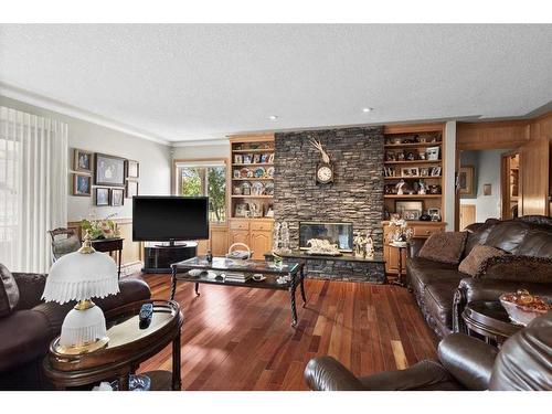 1612 48 Avenue Sw, Calgary, AB - Indoor Photo Showing Living Room With Fireplace