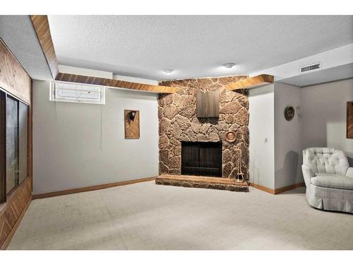 1612 48 Avenue Sw, Calgary, AB - Indoor Photo Showing Living Room With Fireplace