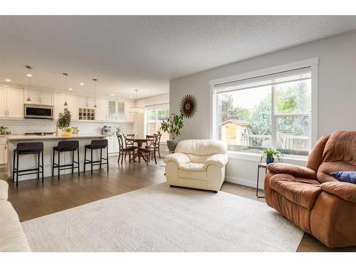 231 Tuscany Ridge View Nw, Calgary, AB - Indoor Photo Showing Living Room