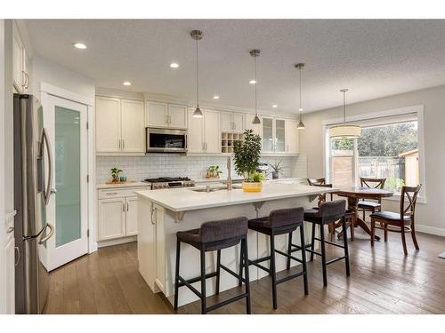 231 Tuscany Ridge View Nw, Calgary, AB - Indoor Photo Showing Kitchen With Upgraded Kitchen