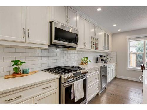 231 Tuscany Ridge View Nw, Calgary, AB - Indoor Photo Showing Kitchen With Upgraded Kitchen