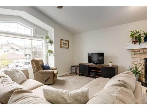 231 Tuscany Ridge View Nw, Calgary, AB - Indoor Photo Showing Living Room