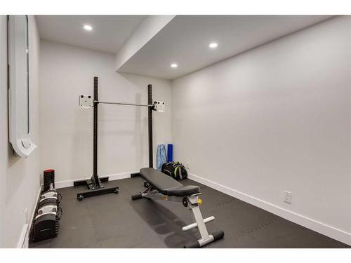 231 Tuscany Ridge View Nw, Calgary, AB - Indoor Photo Showing Gym Room