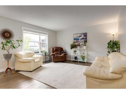 231 Tuscany Ridge View Nw, Calgary, AB - Indoor Photo Showing Living Room