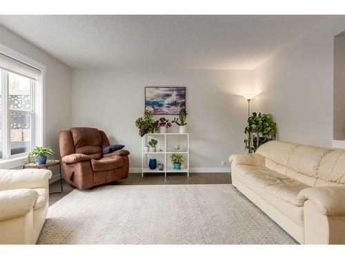 231 Tuscany Ridge View Nw, Calgary, AB - Indoor Photo Showing Living Room