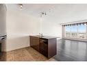 1003-8710 Horton Road Sw, Calgary, AB  - Indoor Photo Showing Kitchen 