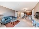 228-500 Rocky Vista Gardens Nw, Calgary, AB  - Indoor Photo Showing Living Room 