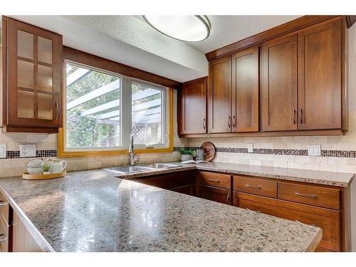 9308 26 Street Sw, Calgary, AB - Indoor Photo Showing Kitchen With Double Sink