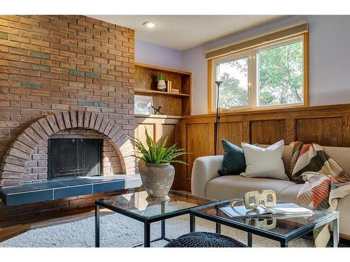 9308 26 Street Sw, Calgary, AB - Indoor Photo Showing Living Room With Fireplace