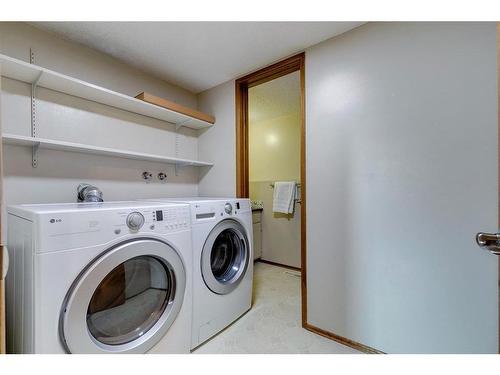 9308 26 Street Sw, Calgary, AB - Indoor Photo Showing Laundry Room