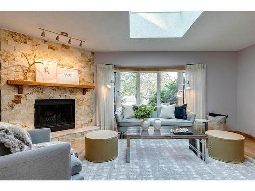 9308 26 Street Sw, Calgary, AB - Indoor Photo Showing Living Room With Fireplace