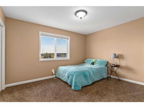 310 Evanspark Circle Nw, Calgary, AB - Indoor Photo Showing Bedroom