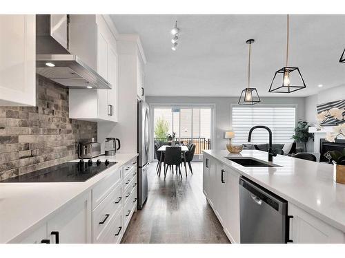 202 Sage Bluff Rise Nw, Calgary, AB - Indoor Photo Showing Kitchen With Upgraded Kitchen