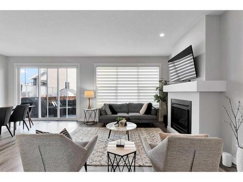 202 Sage Bluff Rise Nw, Calgary, AB - Indoor Photo Showing Living Room With Fireplace