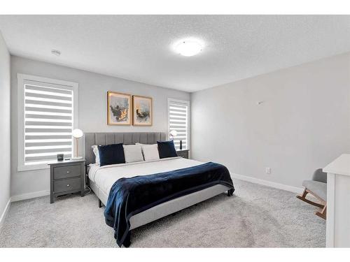 202 Sage Bluff Rise Nw, Calgary, AB - Indoor Photo Showing Bedroom