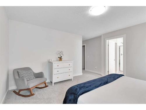 202 Sage Bluff Rise Nw, Calgary, AB - Indoor Photo Showing Bedroom