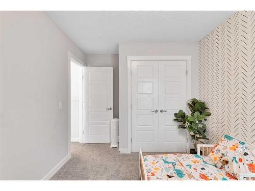 202 Sage Bluff Rise Nw, Calgary, AB - Indoor Photo Showing Bedroom