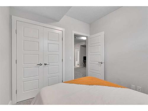 202 Sage Bluff Rise Nw, Calgary, AB - Indoor Photo Showing Bedroom