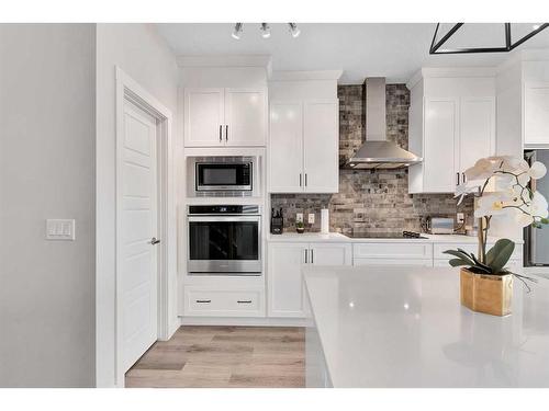 202 Sage Bluff Rise Nw, Calgary, AB - Indoor Photo Showing Kitchen With Upgraded Kitchen