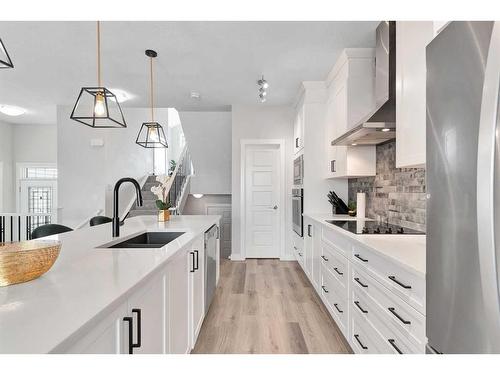 202 Sage Bluff Rise Nw, Calgary, AB - Indoor Photo Showing Kitchen With Double Sink With Upgraded Kitchen