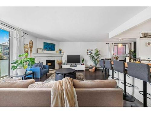 B-518 18 Avenue Sw, Calgary, AB - Indoor Photo Showing Living Room With Fireplace