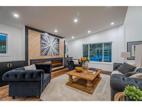 4228 Vauxhall Crescent Nw, Calgary, AB - Indoor Photo Showing Living Room With Fireplace