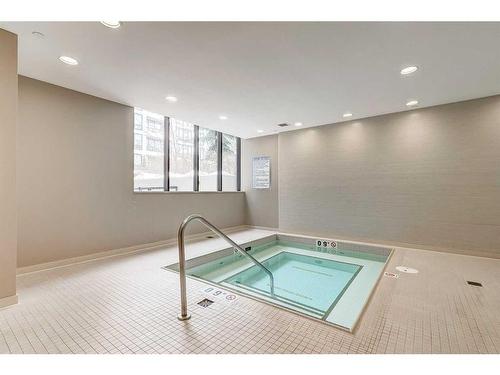 913-222 Riverfront Avenue Sw, Calgary, AB - Indoor Photo Showing Other Room With In Ground Pool